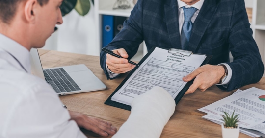 Signing workers' comp papers